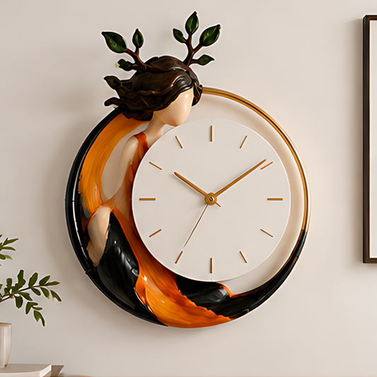 ESSENTIN Nature Spirit Figurine Wall Clock hanging on a wall — artistic home decor with green leaf details and amber figurine